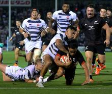 Zarn Sullivan scores the fifth try for the  Māori All Blacks against Japan XV at Tokyo's Prince...