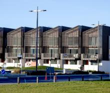 The construction of multi-unit developments like One Central in the central city is likely to...