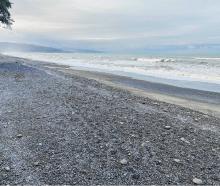 The new bund is providing some protection to Amberley Beach residents for now. PHOTO: DAVID HILL