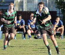 Maheno first five Lachie Kingan shifts the ball with Toby Growcott in support. PHOTO: YAMMIE...