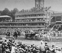 King George V and Queen Mary are driven along the course at Royal Ascot on June 17, 1925. — Otago...