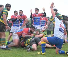 Action from today's premier club rugby match between Green Island and Harbour at Kettle Park....