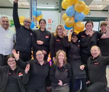 Plaza SuperValue Invercargill owners Jigs and Shelly Buha (back row, second and third from left)...