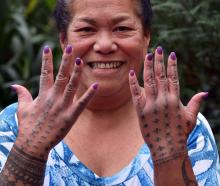 Dunedin-born Samoan Vicky Fitiao proudly shows her Tualima (traditional Samoan hand tattoo), done...