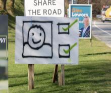 One of Daniel Shand's mysterious signs on Frankton Road, Queenstown. Photo: RNZ/Katie Todd