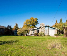 This 1960s home in “one of the best locations in Wānaka” is for sale. Photo: Supplied