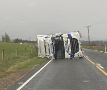 The truck rolled on State Highway 73, west of Springfield. Photo: NZTA