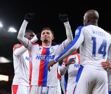 Yeremy Pino of Crystal Palace celebrates scoring his team's third goal with teammates during...