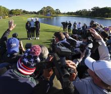 American golfers Nelly Korda (right) and Lauren Nguyen (left) pose alongside WNBA basketball star...