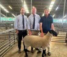 Madison Taylor (left) and Callum Dunnett, from Hazlett Ltd, and vendor Symon Howard with the...