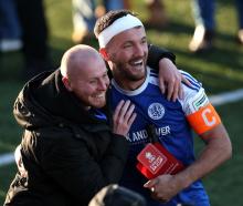 Macclesfield F.C captain Paul Dawson celebrates the historic win. Photo: Reuters 