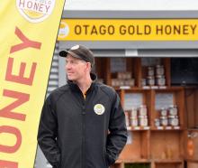 Otago Gold Honey co-owner Tim Sinclair stands guard outside his Waihola stall. Photo: Stephen...