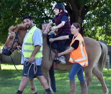 Riding for the Disabled (ESRDA) horse Rudi and rider Evelyn Jones-Carran make their way around...