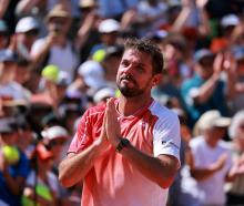 Stan Wawrinka acknowledges the crowd at Roland Garros for the last time. Photo: Reuters 