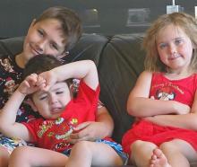 Raymond’s Gap children (from left) Dennis, Daxton and Dallas Roman and their parents are starting...