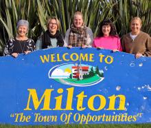 Hoping for the successful sale of the sign are Bruce Community Facilities Trust fundraising ...
