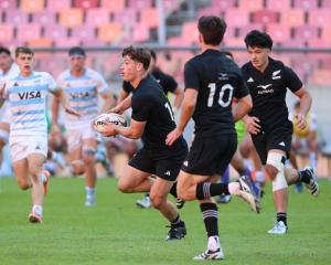 Cooper Roberts runs in midfield for the Baby Blacks. Photo: Getty Images