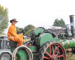 Ruby Friend, 12, sits atop a steam tractor, which was one of a broad range of machines at the...