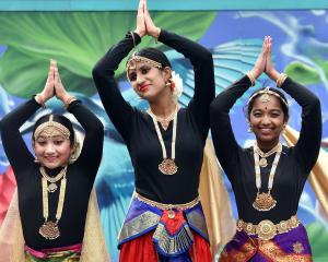 Students of the Naatya School of Indian Dance, from left, Anushka Rajesh, 10, Mansavi Singh, 13,...