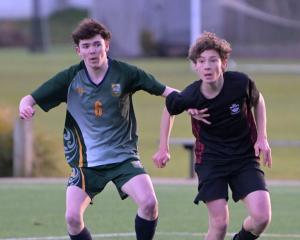Taylor Brown, of Bayfield High School, and Kahu Edmond-Smaill, of Logan Park High School, compete...