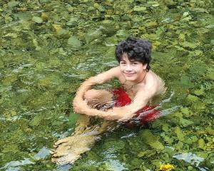 Reynaldo Marasigan enjoys the water at the Glencoe Reserve, in Herbert, North Otago. PHOTO: RON...