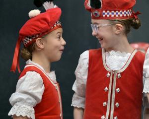 Iaera Abrahamson (left) and Grace le Grelle share a joke as they wait to compete.