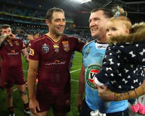 Queensland's Cameron Smith (L) and New South Wales' Paul Gallen after the match. Photo Getty