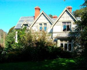 14 and 24 Ferntree Dr, Wakari, Dunedin, bought for $644,000, sold for $585,000.