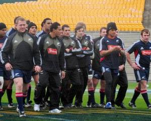 The All Blacks take part in the captain's run at Carisbrook yesterday. Photo by Craig Baxter.