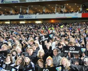 All Black fans show their support in the terraces at the Tri-
...