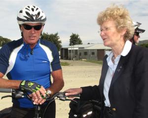 Minster of Conservation Kate Wilkinson discusses the Otago Central Rail Trail with cyclist Jeff...
