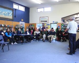 A group of Maniototo and Ranfurly residents listen to Central Otago Mayor Tony Lepper at a...