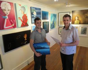 A painting by Queenstown Art Society studio artist Hamish McBride (left) is one of 104 pieces...
