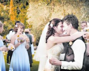 A quiet moment for Darryn and Josie Horrell after their wedding ceremony at Markovina Vineyard,...