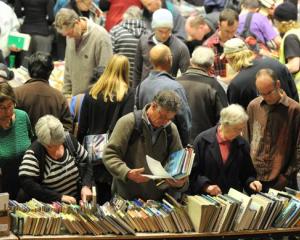 A section of the large crowd look for bargains at the Star Regent 24 Hour Book Sale at the Regent...