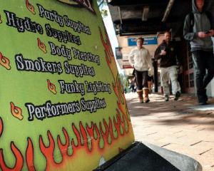 A shop selling 'legal highs' advertises on a busy part of George St in central Dunedin. Photo by...