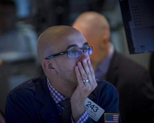 A trader works on the floor of the New York Stock Exchange earlier this month. Photo by Reuters..