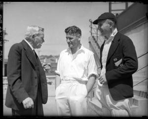 Alex Downes is congratulated by A.W. Roberts and Otago captain Lankford Smith at Carisbrook after...