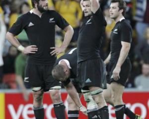 All Blacks (from left) Sam Whitelock, Tony Woodcock, Ritchie McCaw and Conrad Smith show their...