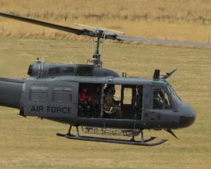 An air force helicopter takes off during the search for missing Dunedin tramper David Palmer.