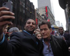 Anger Management star Charlie Sheen still has time for his fans. Photo by Reuters.