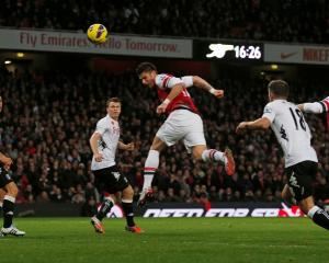 Arsenal's Olivier Giroud scores a goal to equalise in the second half of their Premier League...