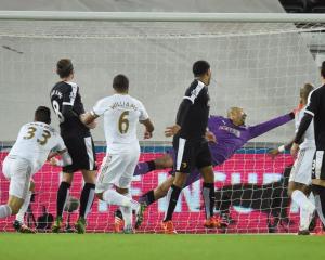 Ashley Williams scores for Swansea. Photo: Reuters