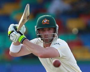 Australia's Phillip Hughes watches a shot as he works towards a century against Sri Lanka  during...