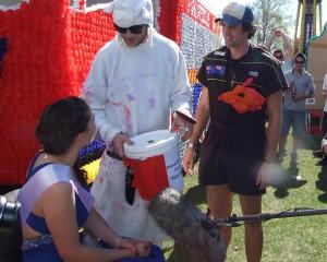 Australian comedians Hamish Blake (centre) and Andy Lee interview  festival princess Sara Hutton...