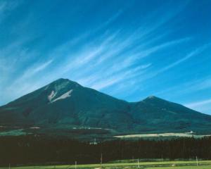 Bandai-san volcano rises to 1800m.