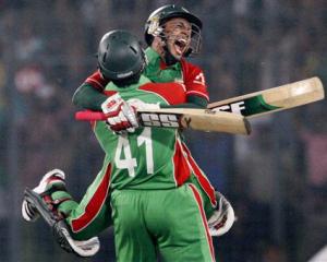 Bangladesh captain Mushfiqur Rahim celebrates with Abdur Razzak (41) after they defeated West...