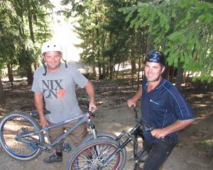 Bike Wanaka Inc members Dan Haydon (left) and Kris Carson inspect the area at Lismore Park where...