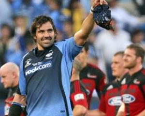 Bulls captain Victor Matfield gestures to fans after his team beat the Crusaders in a Super 14...