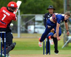 Canterbury batsman Logan van Beek is beaten by a delivery from Otago speedster Warren Barnes in...